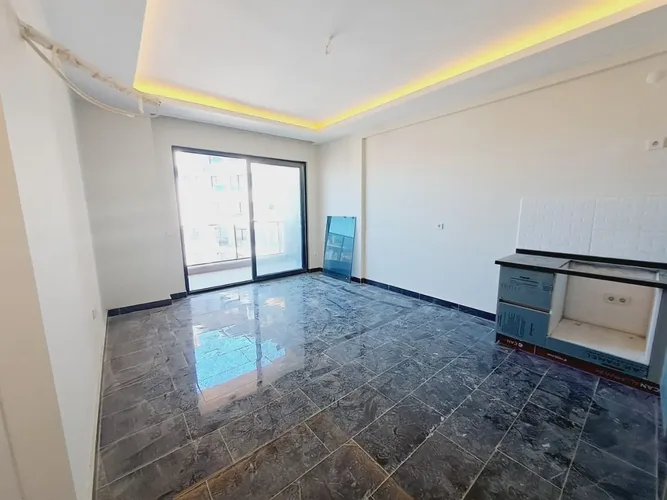 SPACIOUS 1+1 APARTMENT WITH SEA AND CITY VIEW IN MAHMUTLAR