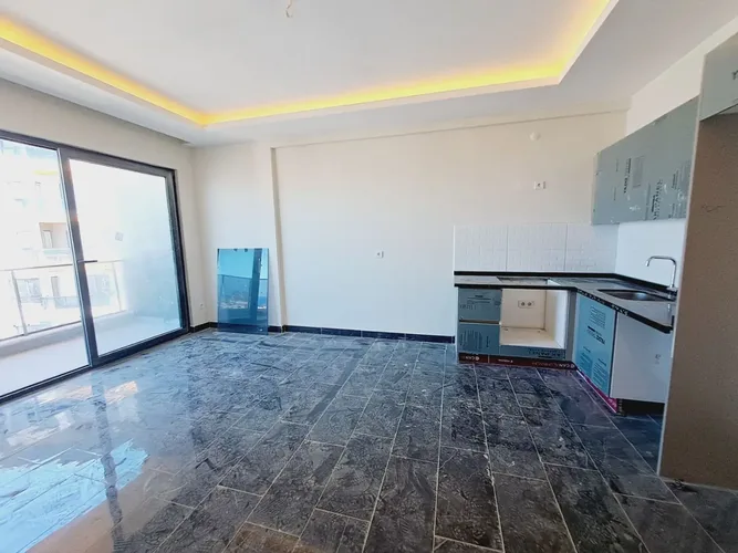 SPACIOUS 1+1 APARTMENT WITH SEA AND CITY VIEW IN MAHMUTLAR