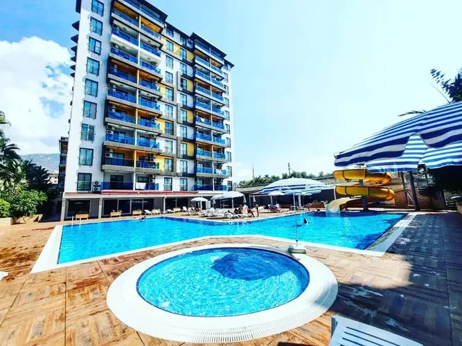 FURNISHED 1+1 APARTMENT IN A LUXURY COMPLEX IN THE CENTER OF ALANYA
