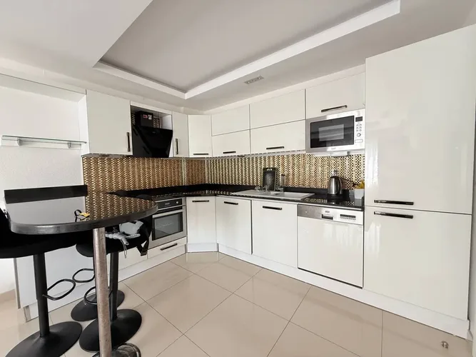 Furnished 1+1 Flat in an Active Site in the Mahmutlar Area