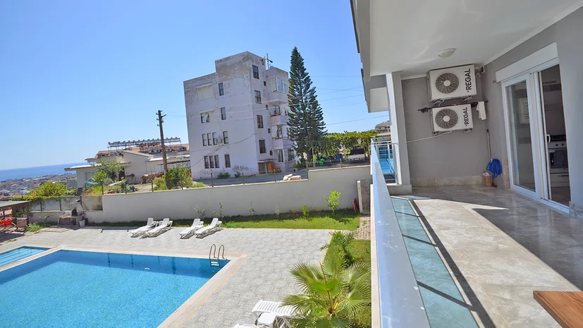 3+1 APARTMENT WITH SEA VIEW AND SEPARATE KITCHEN IN CİKCİLLİ