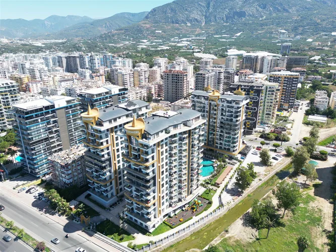 LUXURY 1+1 APARTMENT RIGHT ON THE BEACH IN ALANYA MAHMUTLAR.