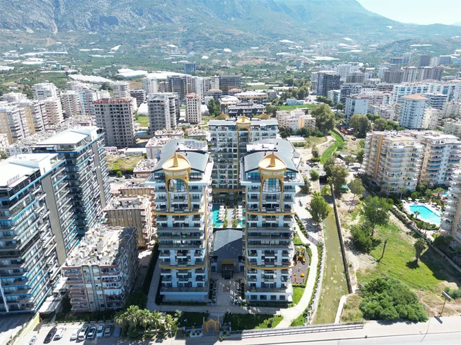 LUXURY 1+1 APARTMENT RIGHT ON THE BEACH IN ALANYA MAHMUTLAR.