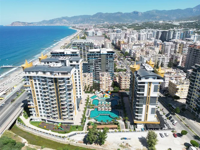 LUXURY 1+1 APARTMENT RIGHT ON THE BEACH IN ALANYA MAHMUTLAR.