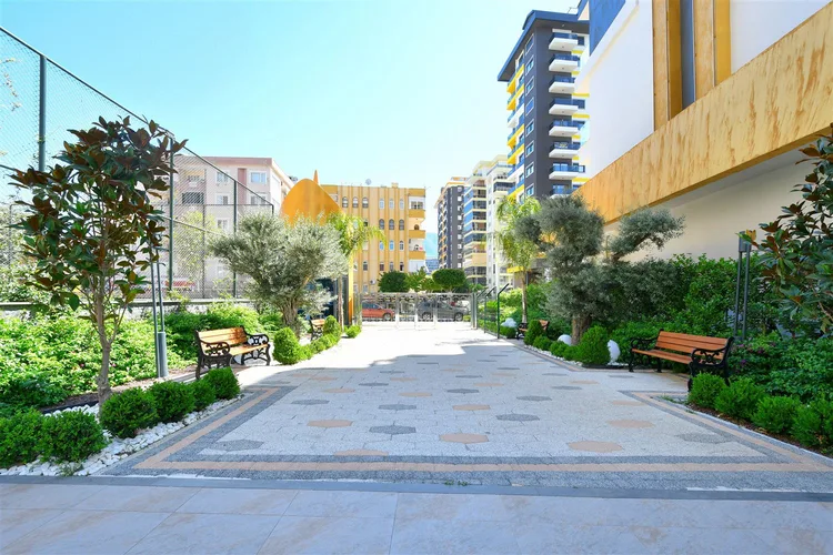 LUXURY 1+1 APARTMENT RIGHT ON THE BEACH IN ALANYA MAHMUTLAR.