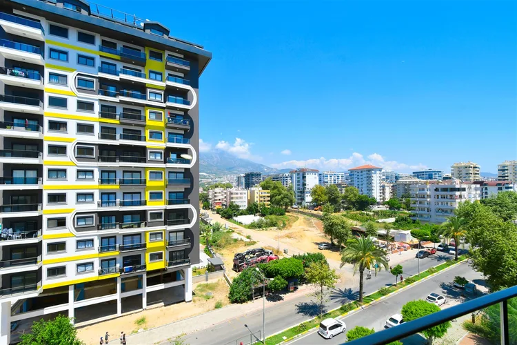 LUXURY 1+1 APARTMENT RIGHT ON THE BEACH IN ALANYA MAHMUTLAR.