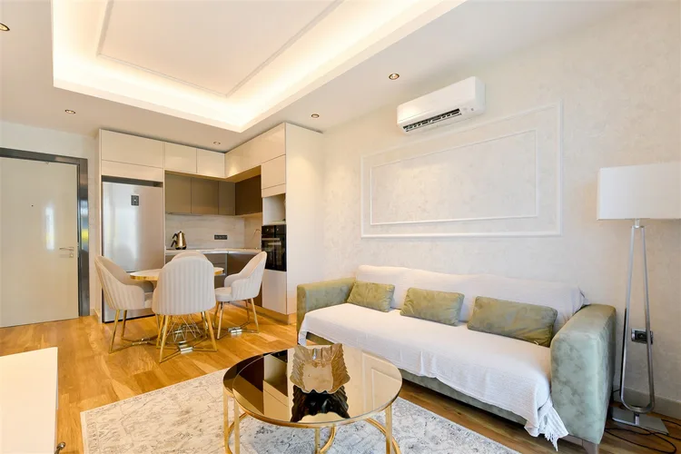LUXURY 1+1 APARTMENT RIGHT ON THE BEACH IN ALANYA MAHMUTLAR.