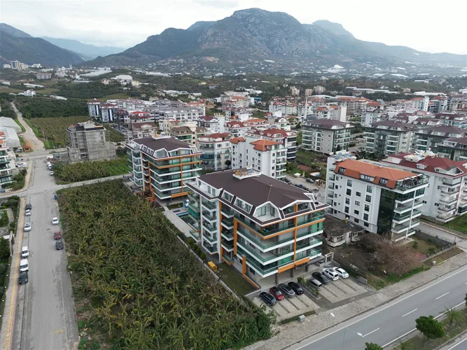 1+1 FURNISHED APARTMENT RIGHT ON THE BEACH IN ALANYA KESTEL.