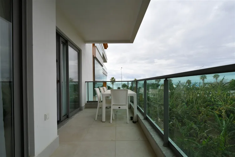 1+1 FURNISHED APARTMENT RIGHT ON THE BEACH IN ALANYA KESTEL.