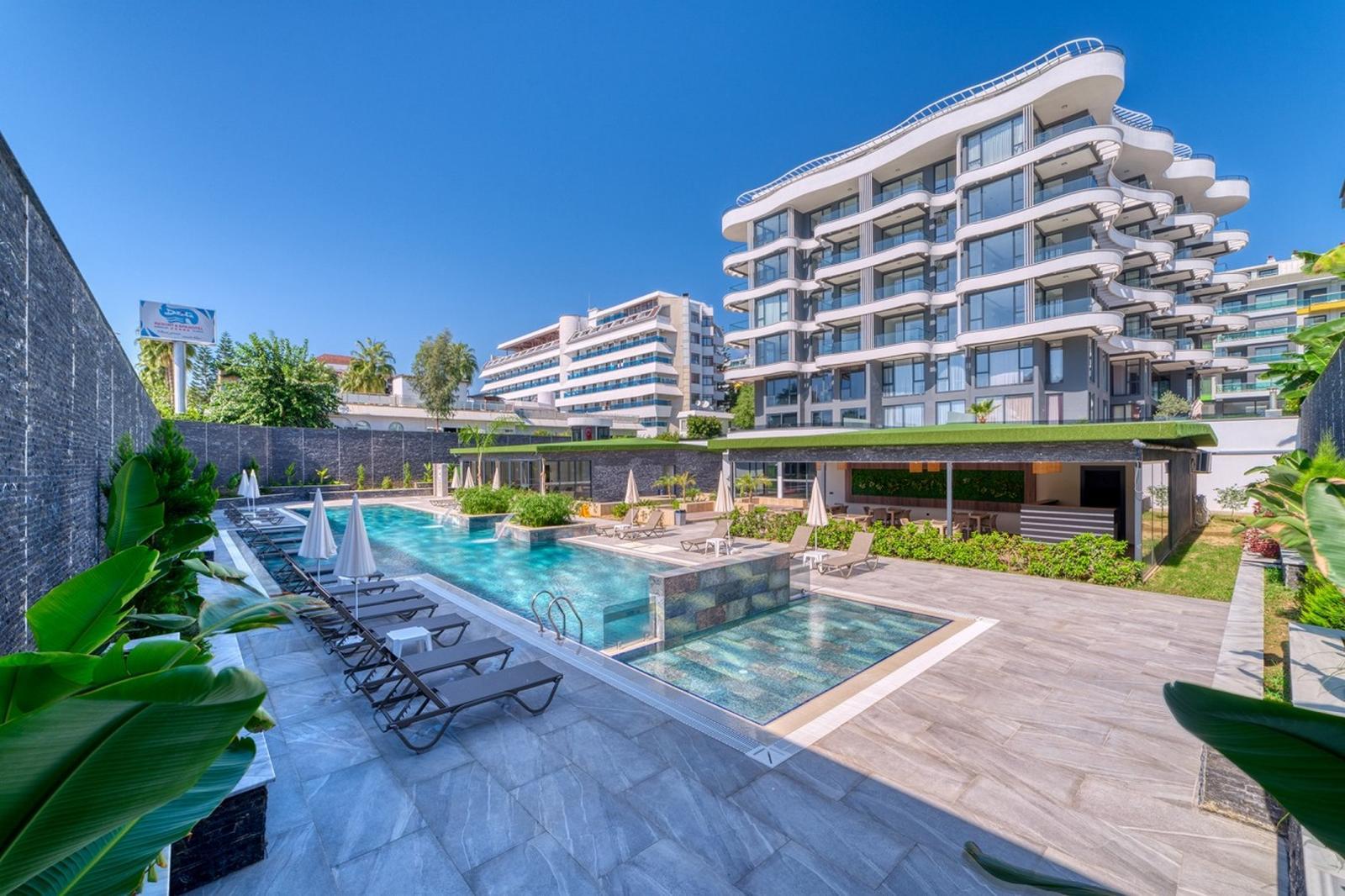 LUXURY 1+1 APARTMENT DIRECTLY BY THE SEA IN ALANYA KARGICAK
