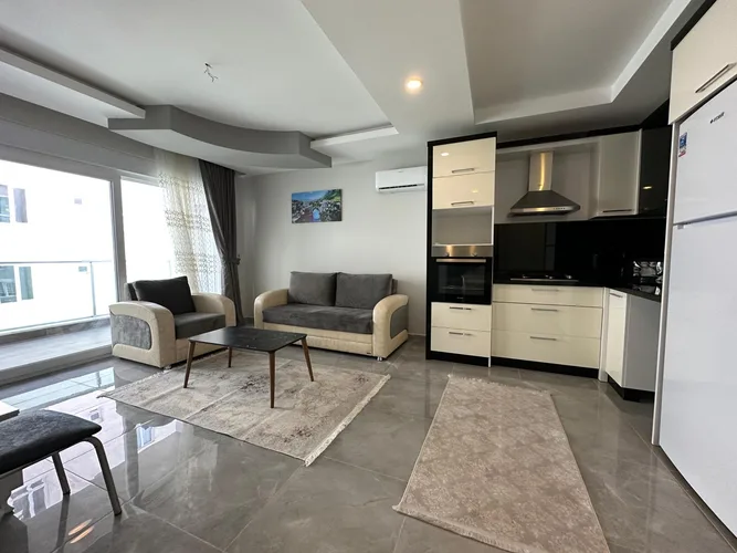 Купить квартиру 1 спальня в Махмутларе, Аланья — с мебелью, Interior - 1